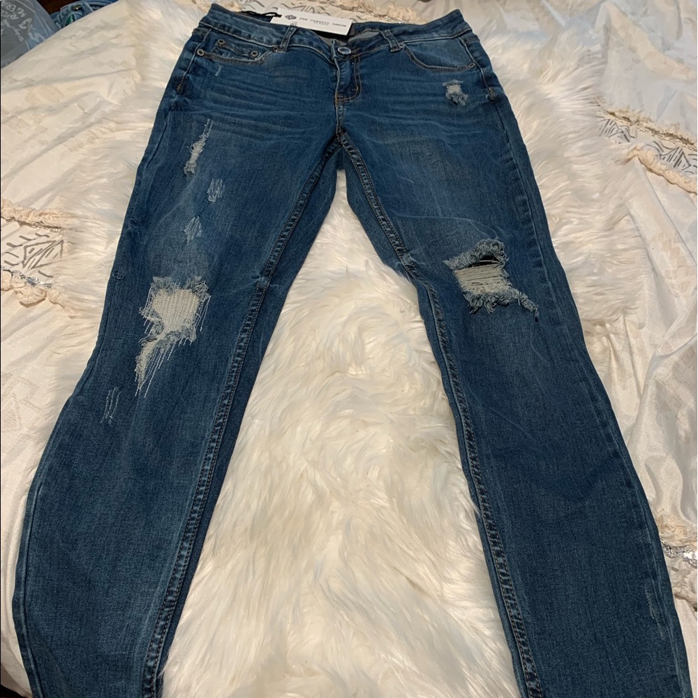 Brand new blue jeans slightly faded stretchy and very cute they are skinny leg